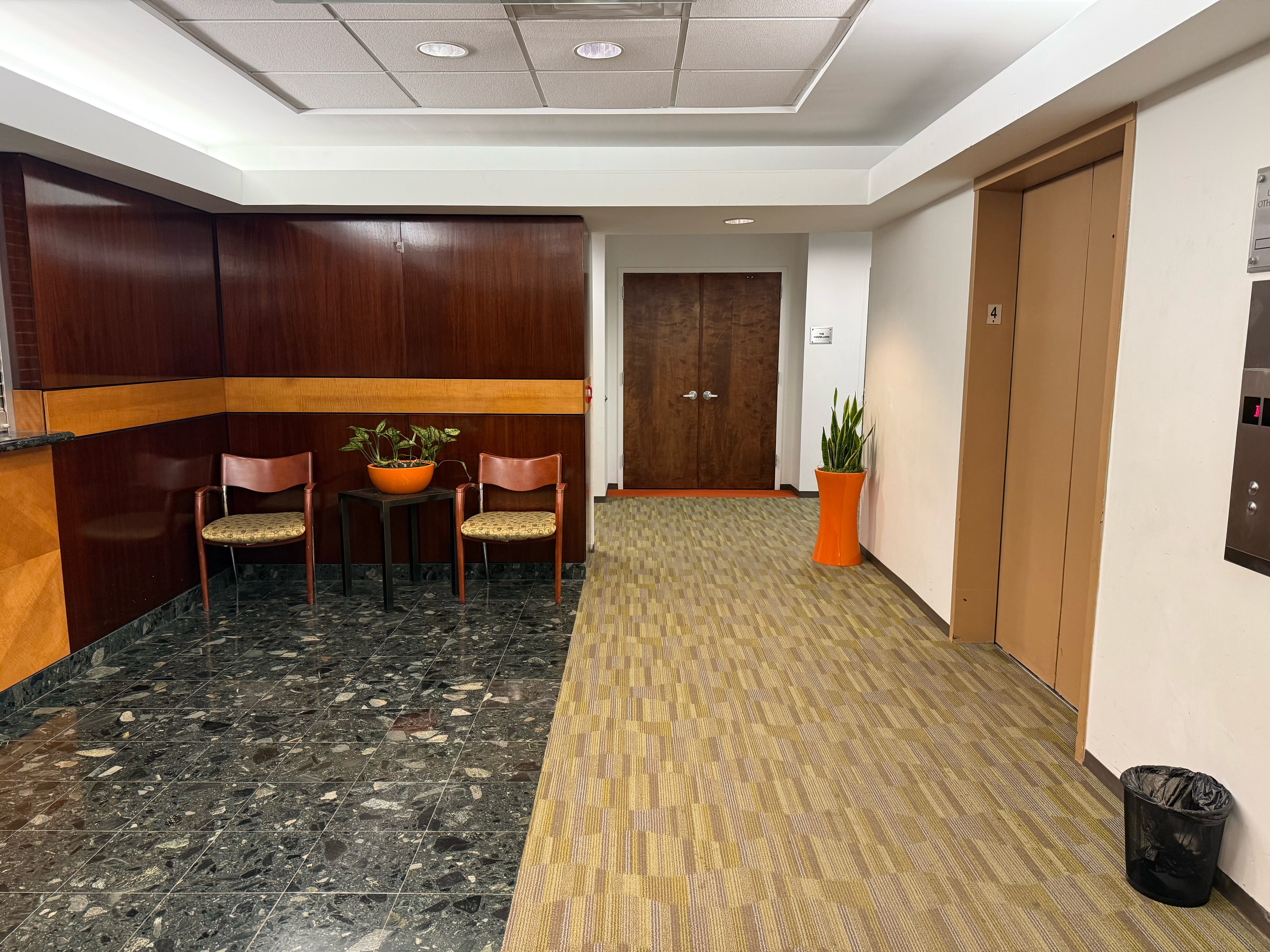 Welcoming 4th-floor lobby and waiting area at 600 Mamaroneck Avenue